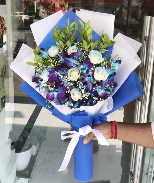 Blue orchids and white roses elegance